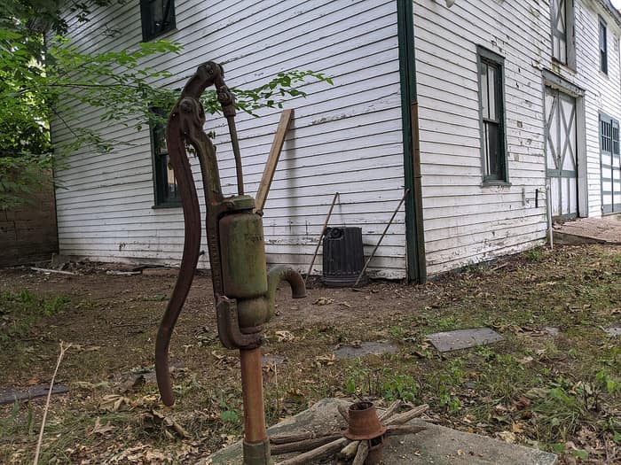 Old water pump of Dutch Colonial style at the Wyckoff-Bennett Homestead
