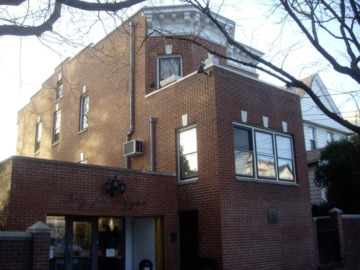 La casa de ladrillo de Louis Armstrong en la calle 107, en Corona, Queens